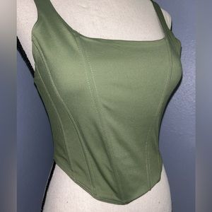 Size Medium. Super soft corset top. Very comfortable, Never been worn.